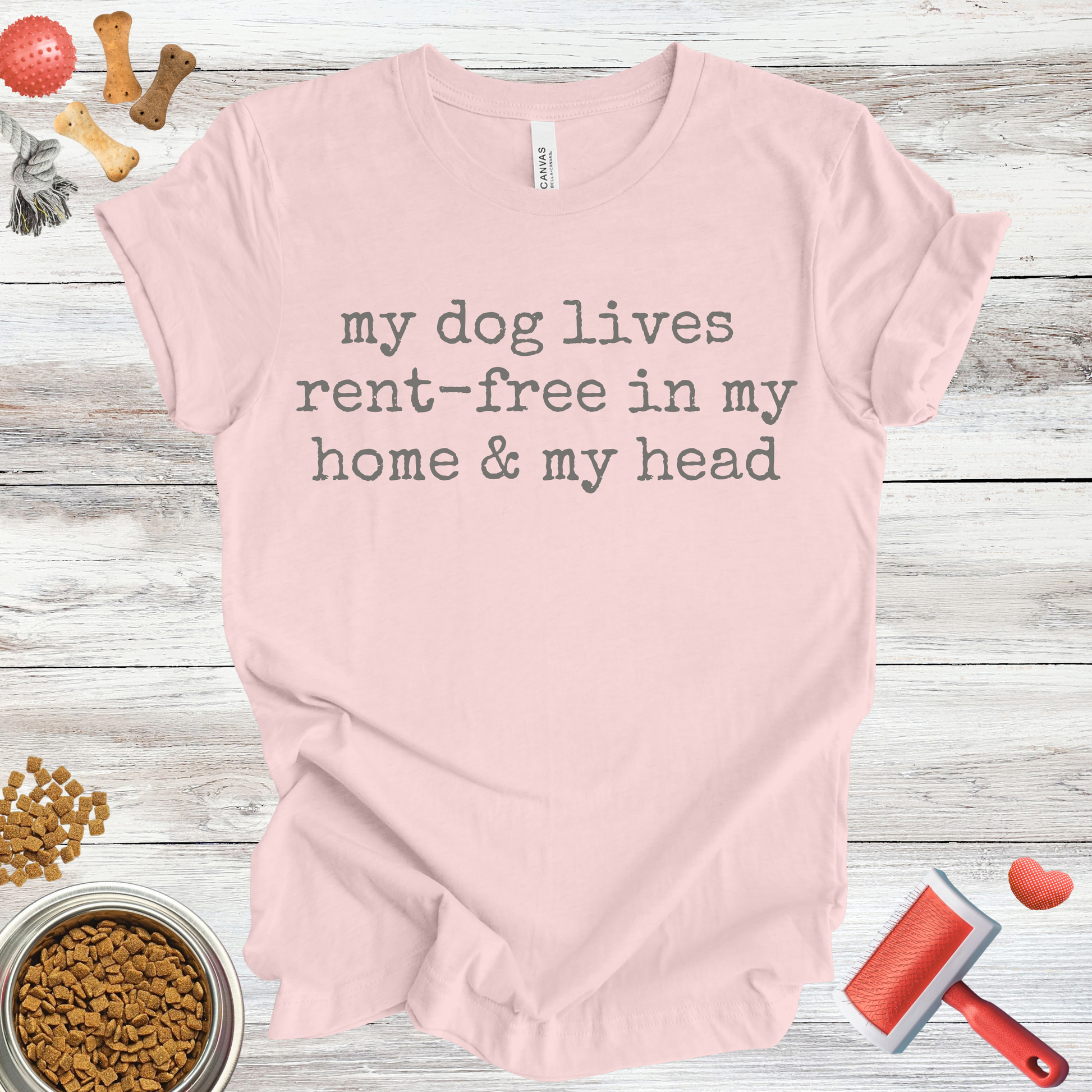 My Dog Lives Rent-Free In My Home & My Head dog t-shirt in Soft Pink — Paw Shaped Love